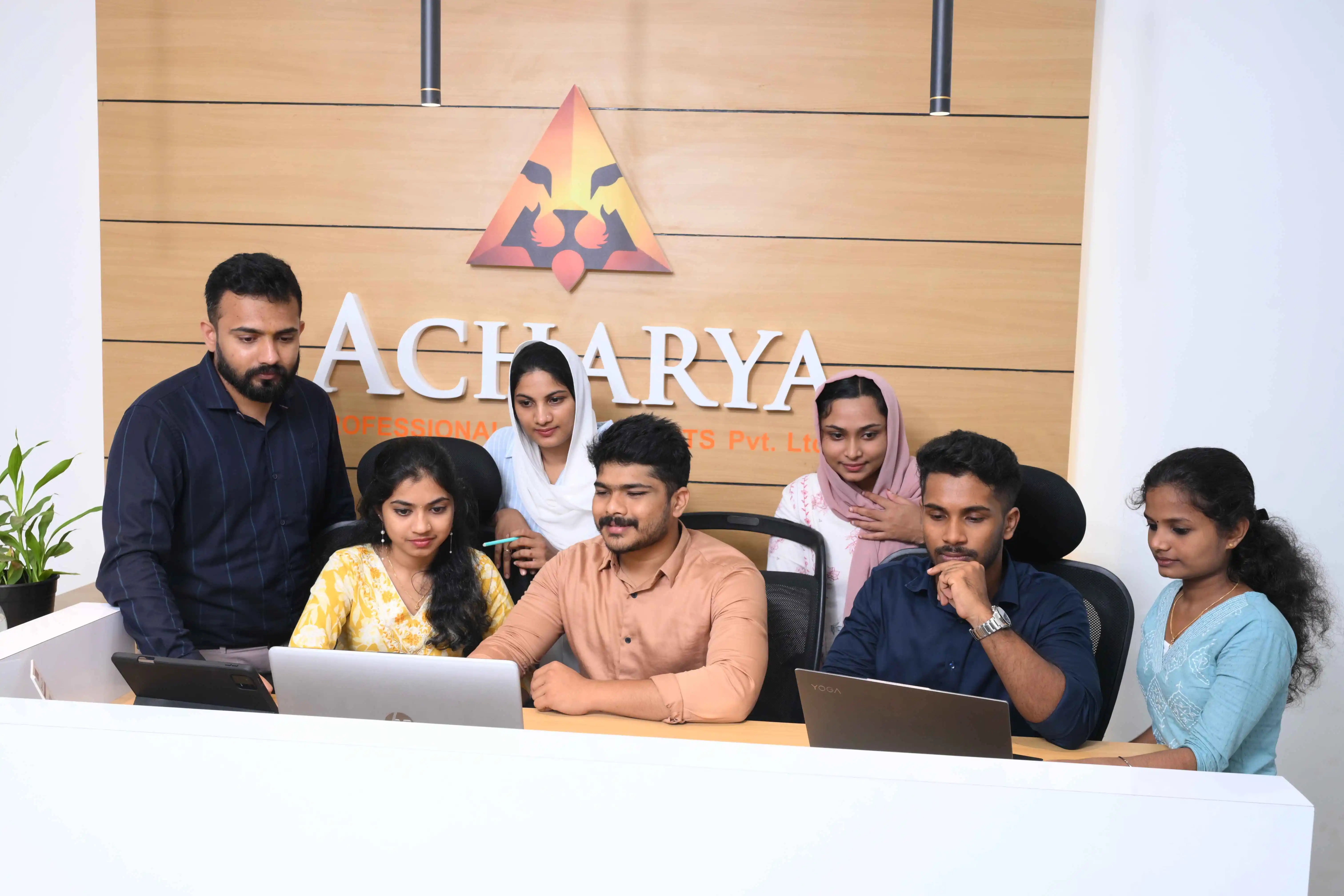 Acharya Professional Accountants team